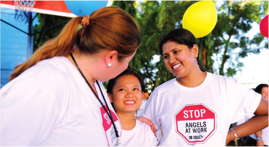 Brady volunteers at a community event