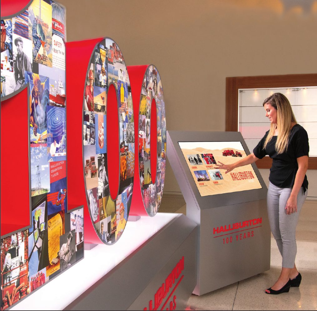 Halliburton 100 Years installation with an interactive kiosk